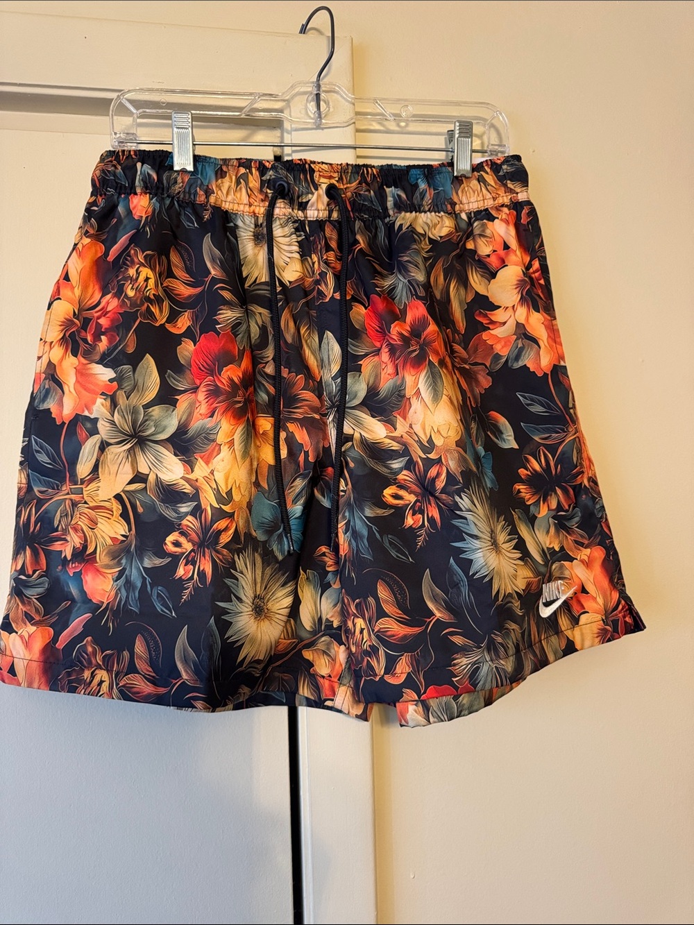 Nike Black Athletic Shorts with Orange, Red and Yellow Floral Print